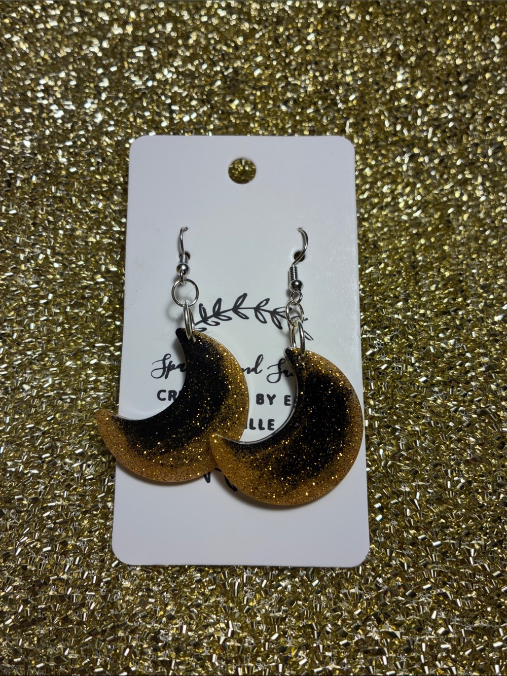Gold and black moon earrings